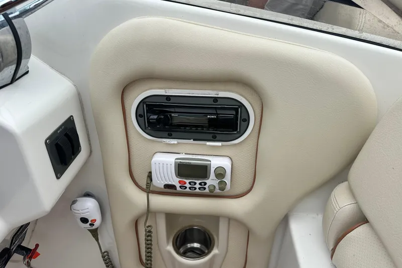 Slide: The Image of 2007 Chris-Craft Corsair 33 Heritage Edition dashboard with radio and control panel. - 8