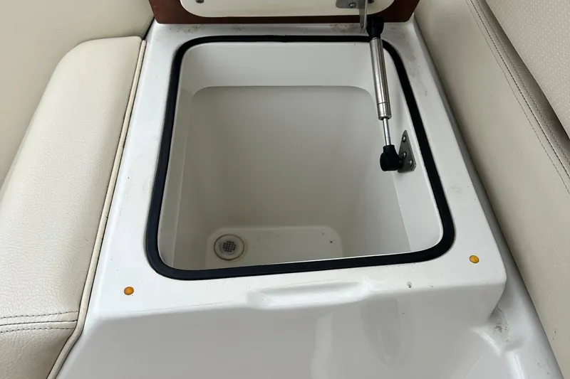 Slide: The Image of Open storage compartment on 2007 Chris-Craft Corsair 33 Heritage Edition boat. - 9