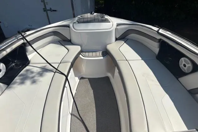 Slide: The Image of 2020 Yamaha Boats AR240 interior with spacious seating and modern design. - 12