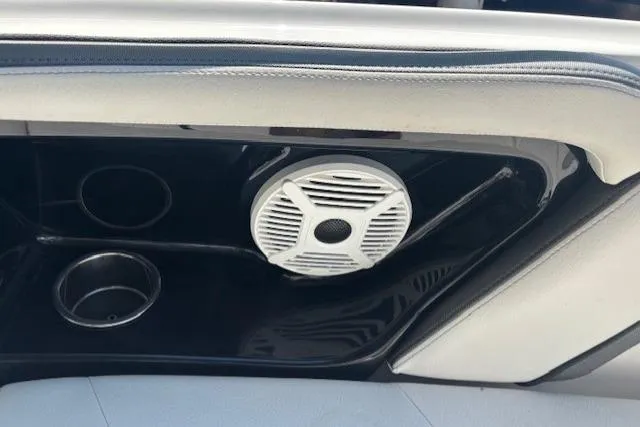 Slide: The Image of Interior of 2020 Yamaha AR240 boat featuring speaker and cup holders. - 17