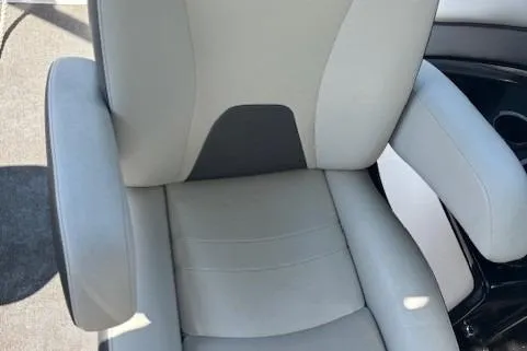 Slide: The Image of 2020 Yamaha Boats AR240 seat with gray upholstery and armrests. - 18