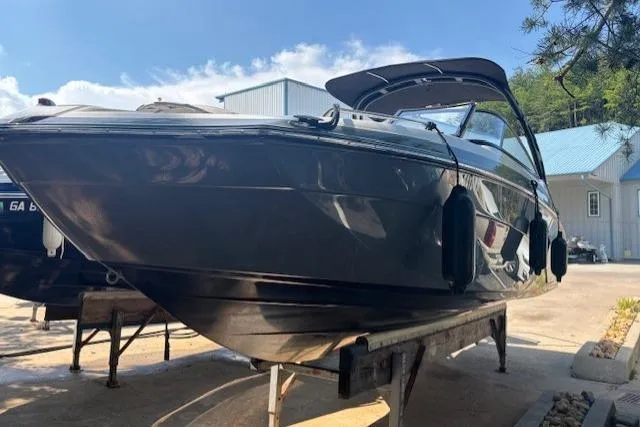 Slide: The Image of 2020 Yamaha Boats AR240 on trailer, sleek design, outdoor setting. - 2