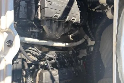 Slide: The Image of 2020 Yamaha AR240 engine compartment with visible components and wiring. - 21