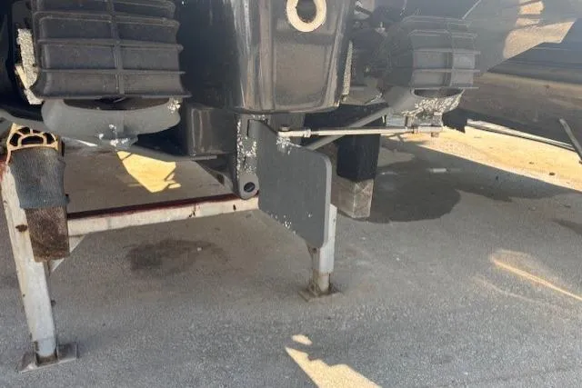 Slide: The Image of 2020 Yamaha Boats AR240 underside view on a trailer, showing engine and propeller details. - 5