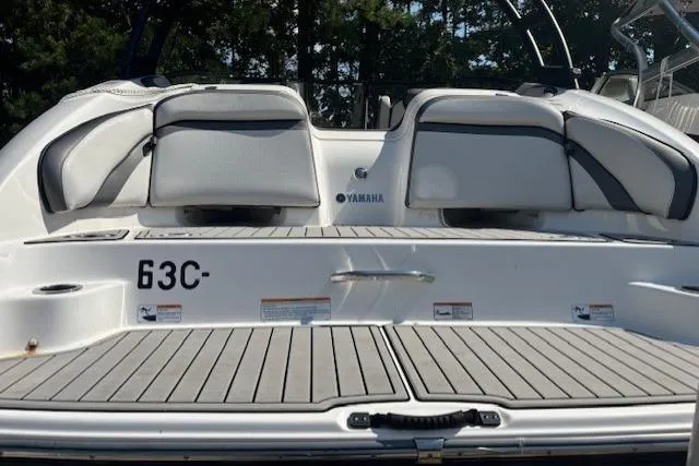 Slide: The Image of 2020 Yamaha Boats AR240 rear view with seating and swim platform. - 6
