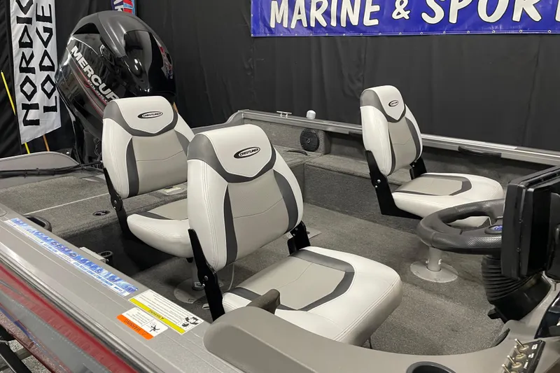 Slide: The Image of 2014 Crestliner 1750 Fish Hawk interior with two seats and Mercury engine. - 7