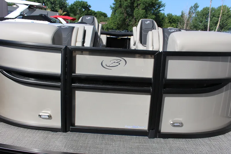 Slide: The Image of 2026 Barletta Cabrio 22QC pontoon boat with beige seating and sleek design. - 4