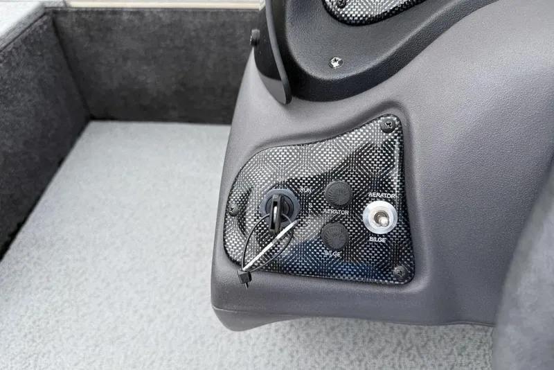 Slide: The Image of Control panel of 2019 Tracker Pro 170 boat with switches and key ignition. - 13