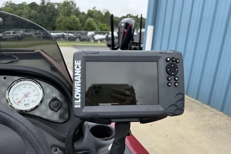Slide: The Image of Lowrance fish finder on 2019 Tracker Pro 170 boat dashboard, near speedometer. - 15