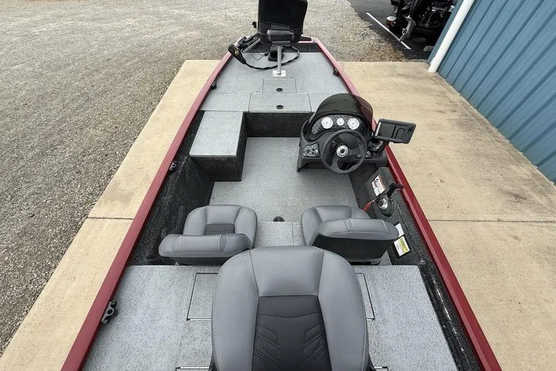 Slide: The Image of 2019 Tracker Pro 170 boat interior with steering console and seating. - 19