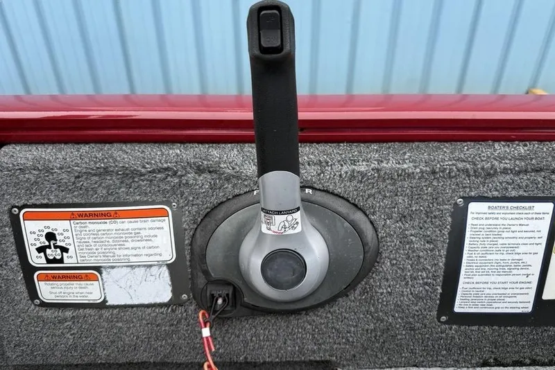 Slide: The Image of 2019 Tracker Pro 170 boat throttle control with safety warnings and boater's checklist. - 20