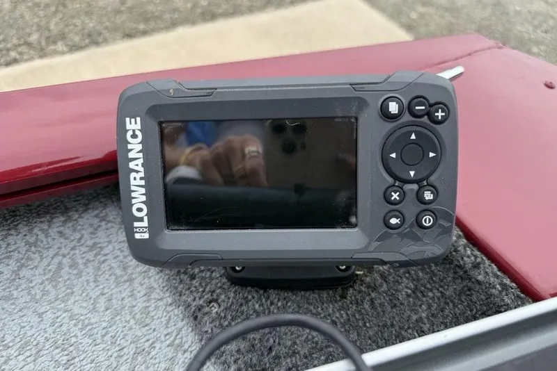 Slide: The Image of Lowrance fish finder on 2019 Tracker Pro 170 boat dashboard. - 3