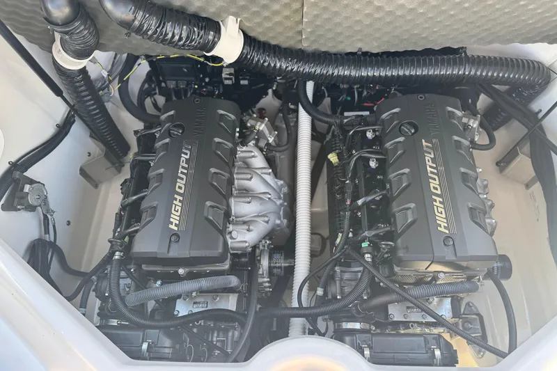 Slide: The Image of 2022 Yamaha Boats 212 engine compartment with dual high output engines. - 20