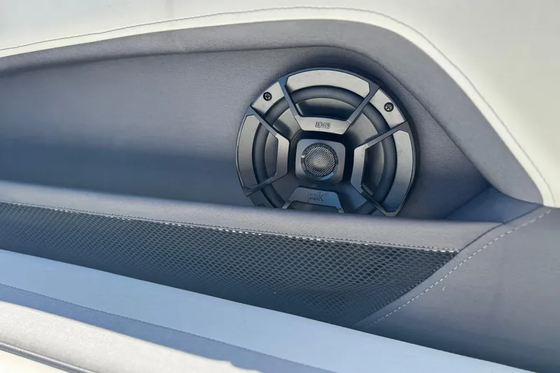Slide: The Image of Speaker detail in 2022 Yamaha Boats 212, showcasing sleek interior design. - 21