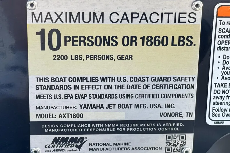 Slide: The Image of Yamaha Boats 2022 model 212 capacity label, 10 persons or 1860 lbs, safety compliance. - 33