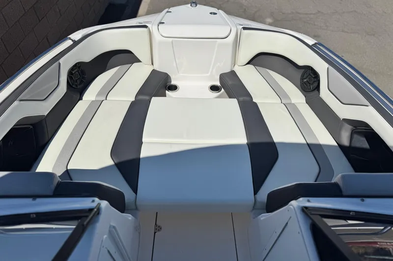 Slide: The Image of 2022 Yamaha Boats 212 interior with sleek seating and modern design. - 9