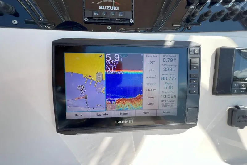 Slide: The Image of Garmin navigation display on 2022 Pioneer 202 Islander boat dashboard. - 10