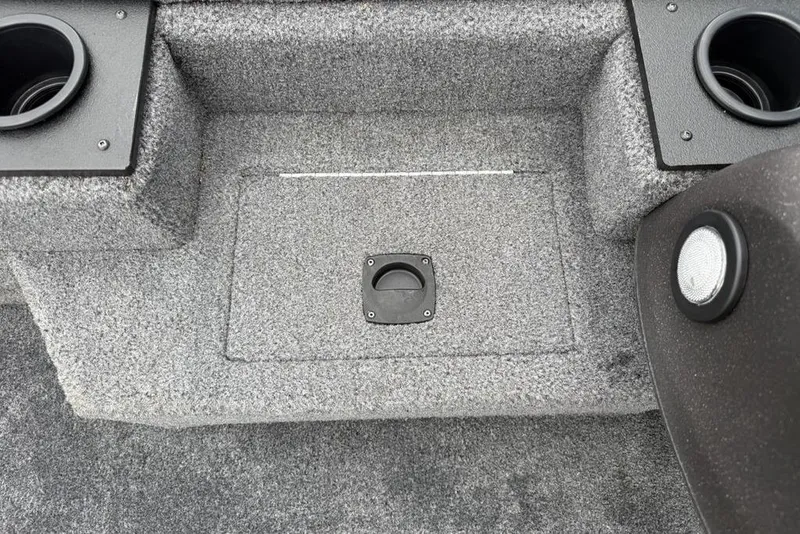 Slide: The Image of 2024 Tracker Pro Team 175 TXW® boat interior with carpeted storage compartment. - 11