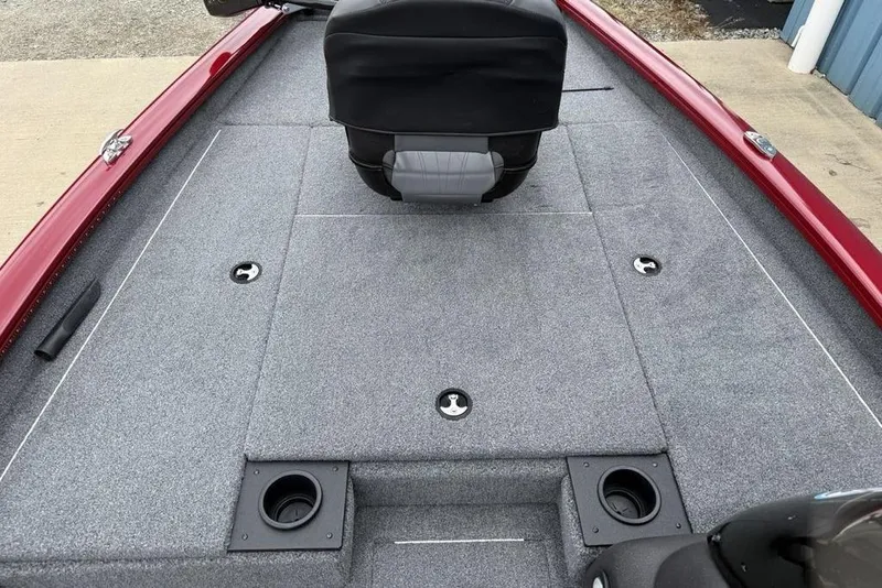 Slide: The Image of 2024 Tracker Pro Team 175 TXW® boat interior with gray carpet and seating. - 13