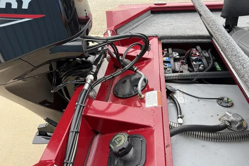 Slide: The Image of 2024 Tracker Pro Team 175 TXW® boat engine and battery compartment detail. - 16
