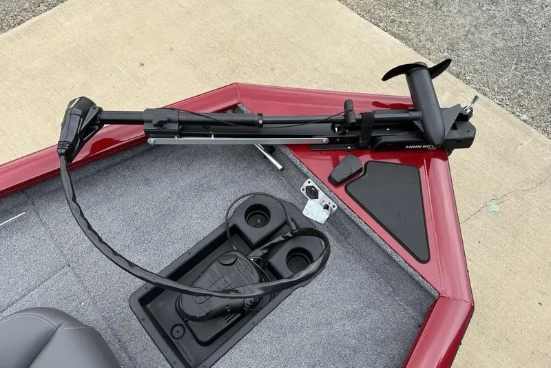 Slide: The Image of 2024 Tracker Pro Team 175 TXW® boat with trolling motor and foot pedal controls. - 2