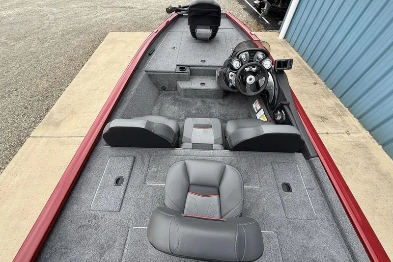 Slide: The Image of 2024 Tracker Pro Team 175 TXW® boat interior with gray seating and control panel. - 21