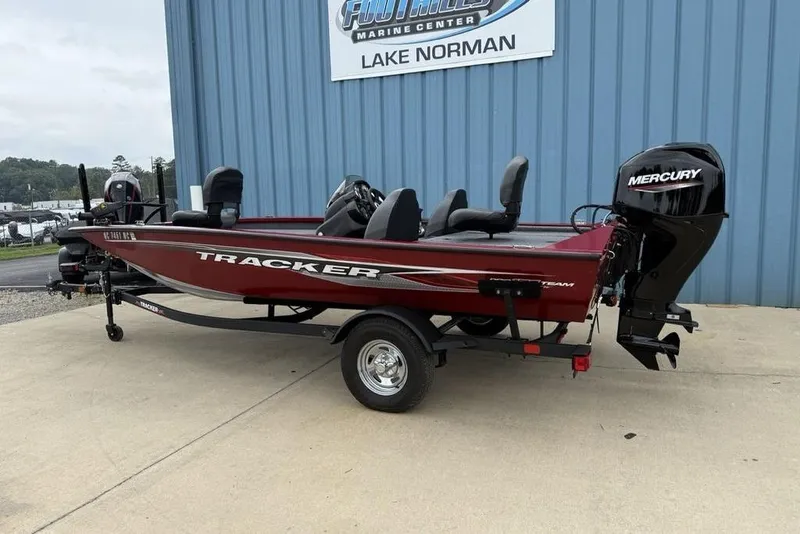Slide: The Image of 2024 Tracker Pro Team 175 TXW® boat with Mercury engine, parked at Lake Norman. - 3