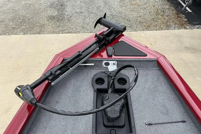 Slide: The Image of 2024 Tracker Pro Team 175 TXW® boat bow with trolling motor and carpeted deck. - 4