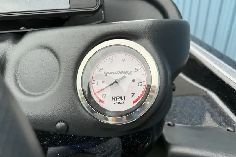 Slide: The Image of Close-up of 2019 Phoenix 921 PRO XP tachometer displaying RPM gauge. - 21