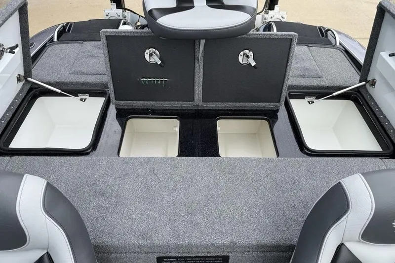 Slide: The Image of 2019 Phoenix 921 PRO XP boat storage compartments and seating area. - 26