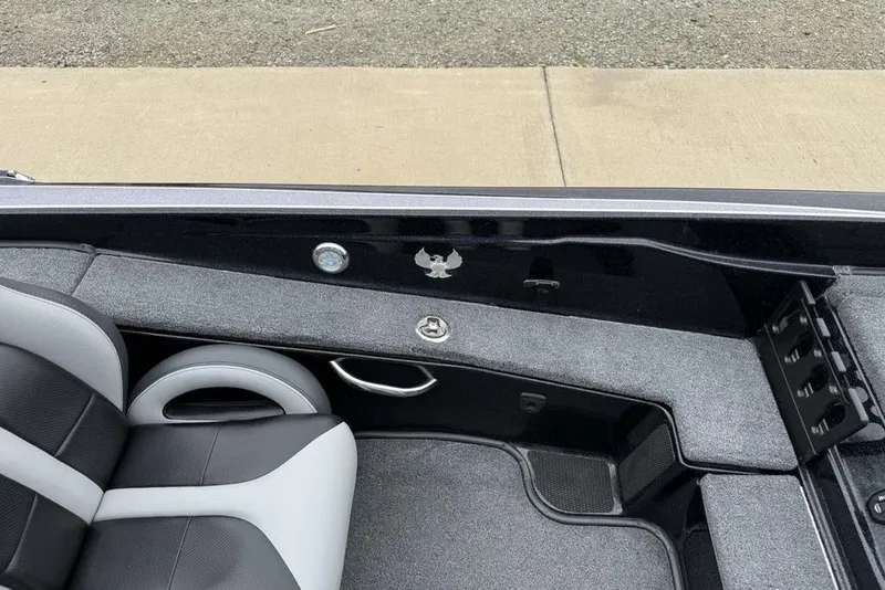 Slide: The Image of Interior of a 2019 Phoenix 921 PRO XP boat with gray and black seating. - 7