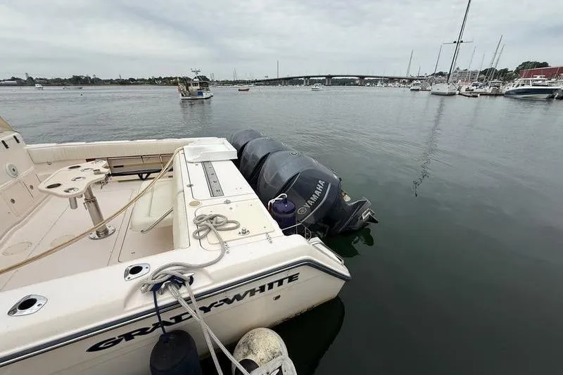 Slide: The Image of 2008 Grady-White Express 360 boat docked with Yamaha outboard engines in a marina. - 5