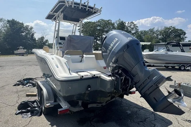 Slide: The Image of 2019 Key West 219fs boat with Yamaha outboard motor on a trailer. - 3
