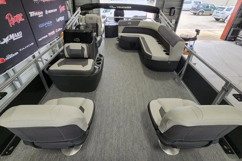 Slide: The Image of 2026 Sun Tracker BASS BUGGY® 18 DLX pontoon boat interior with spacious seating and modern design. - 4