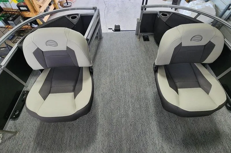 Slide: The Image of 2026 Sun Tracker BASS BUGGY® 18 DLX boat interior with two cushioned seats. - 8