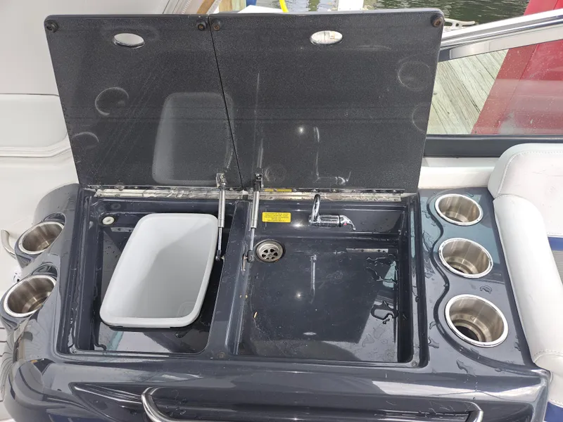 Slide: The Image of 2018 Formula 350 Sun Sport boat sink and cup holders on deck. - 37