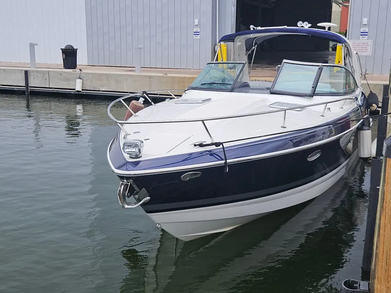 Slide: The Image of 2018 Formula 350 Sun Sport boat docked in marina. - 6