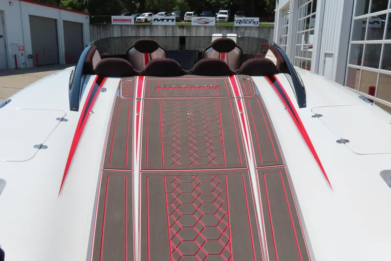 Slide: The Image of 2018 Wright Performance 360 boat with sleek red and gray deck design. - 13