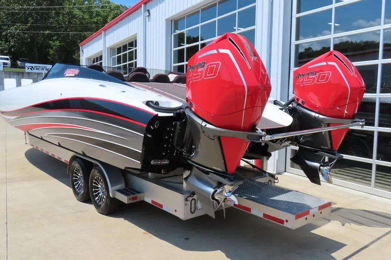 Slide: The Image of 2018 Wright Performance 360 boat with twin red Racing 450 engines on a trailer. - 9