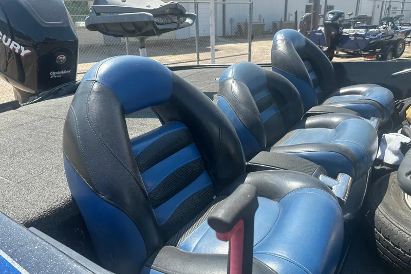 Slide: The Image of 2012 Nitro Z-9 boat with blue and black seats, featuring a Mercury OptiMax Pro engine. - 10