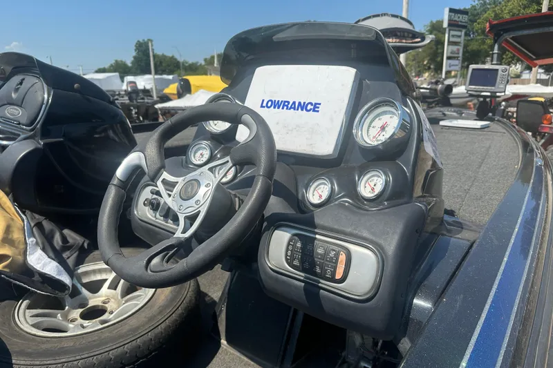 Slide: The Image of Steering console of a 2012 Nitro Z-9 boat with Lowrance electronics and gauges. - 9