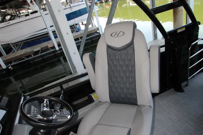 Slide: The Image of Captain's chair and steering wheel of 2020 Harris FloteBote Solstice 250 SL pontoon boat. - 10