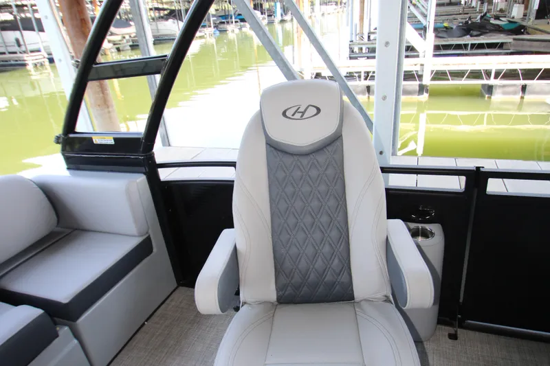 Slide: The Image of 2020 Harris FloteBote Solstice 250 SL boat interior with luxury seating. - 11