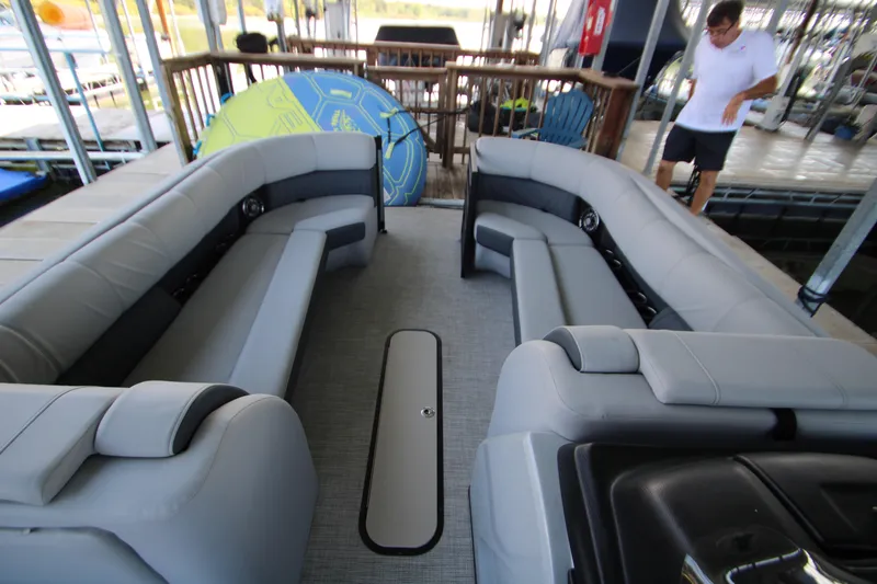 Slide: The Image of 2020 Harris FloteBote Solstice 250 SL pontoon boat with spacious seating and modern design. - 19