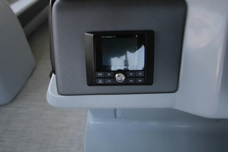 Slide: The Image of 2020 Harris FloteBote Solstice 250 SL audio control panel close-up. - 21