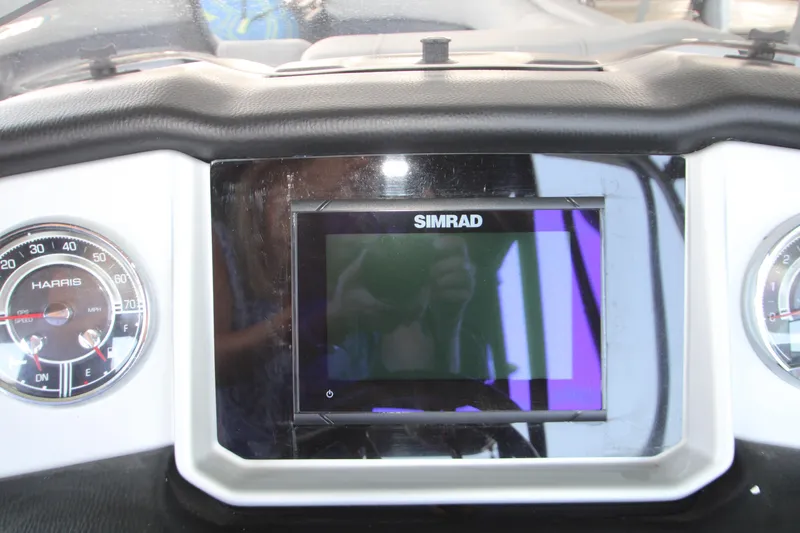 Slide: The Image of Dashboard of 2020 Harris FloteBote Solstice 250 SL with Simrad display and gauges. - 22