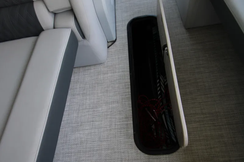 Slide: The Image of Storage compartment on 2020 Harris FloteBote Solstice 250 SL pontoon boat interior. - 27