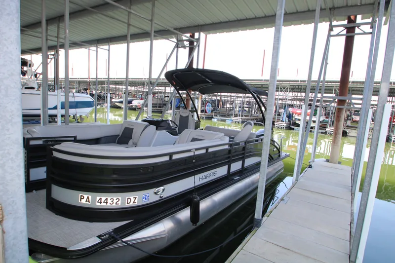 Slide: The Image of 2020 Harris FloteBote Solstice 250 SL pontoon boat docked in marina. - 38