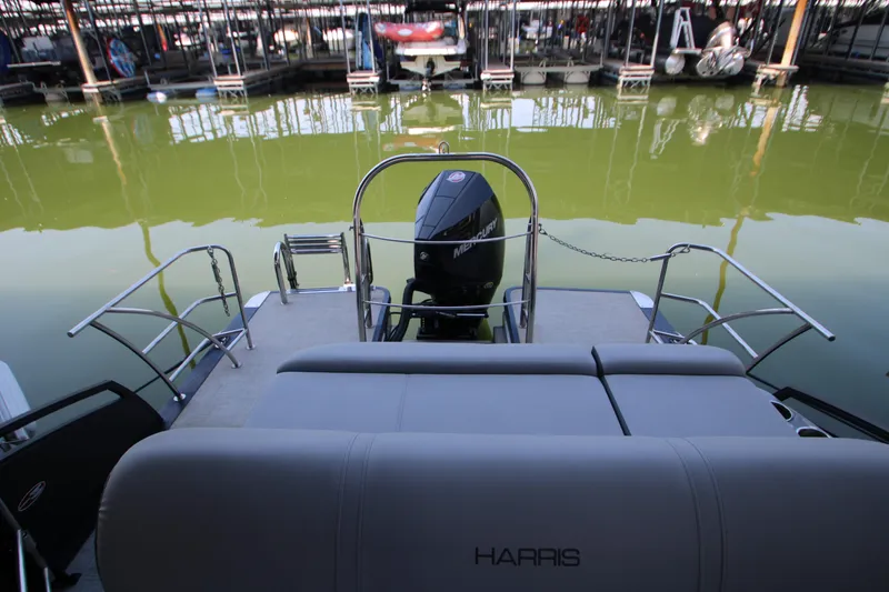 Slide: The Image of 2020 Harris FloteBote Solstice 250 SL pontoon boat with Mercury engine at dock. - 5