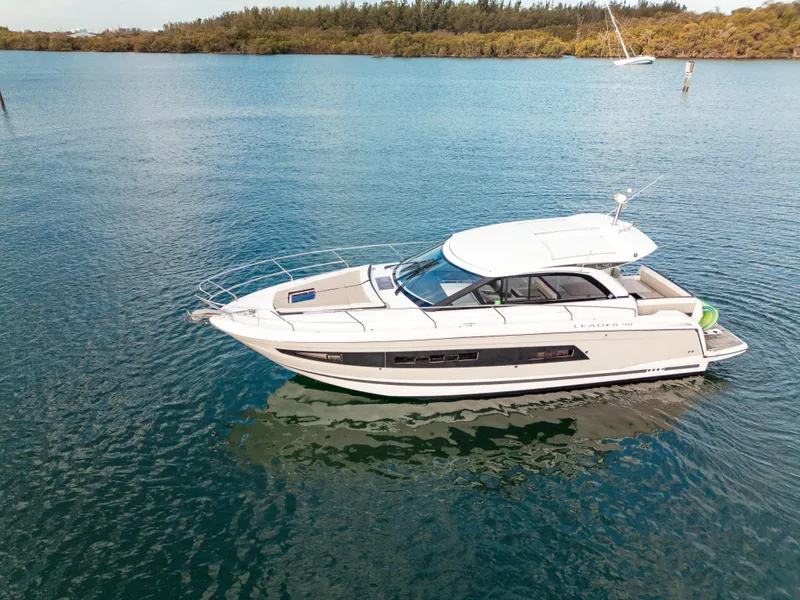 Slide: The Image of 2018 Jeanneau Leader 40 yacht on calm water, showcasing sleek design and modern features. - 48